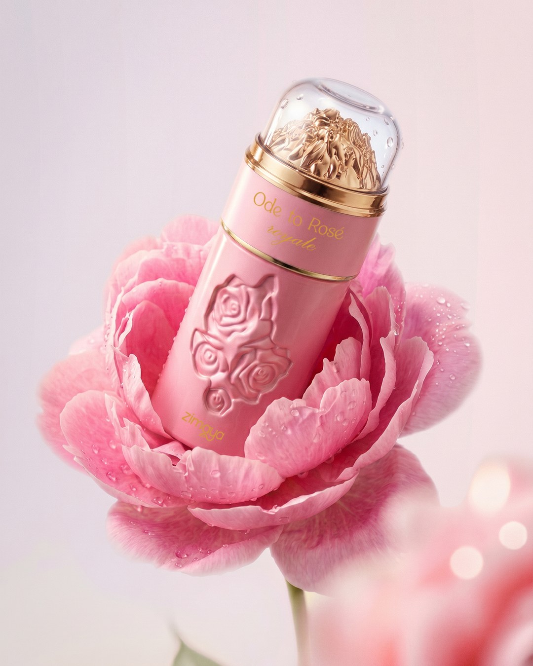 Pink Ode to Rose perfume nestled inside an oversized pink rose — AI perfume imagery by The Media Lab.