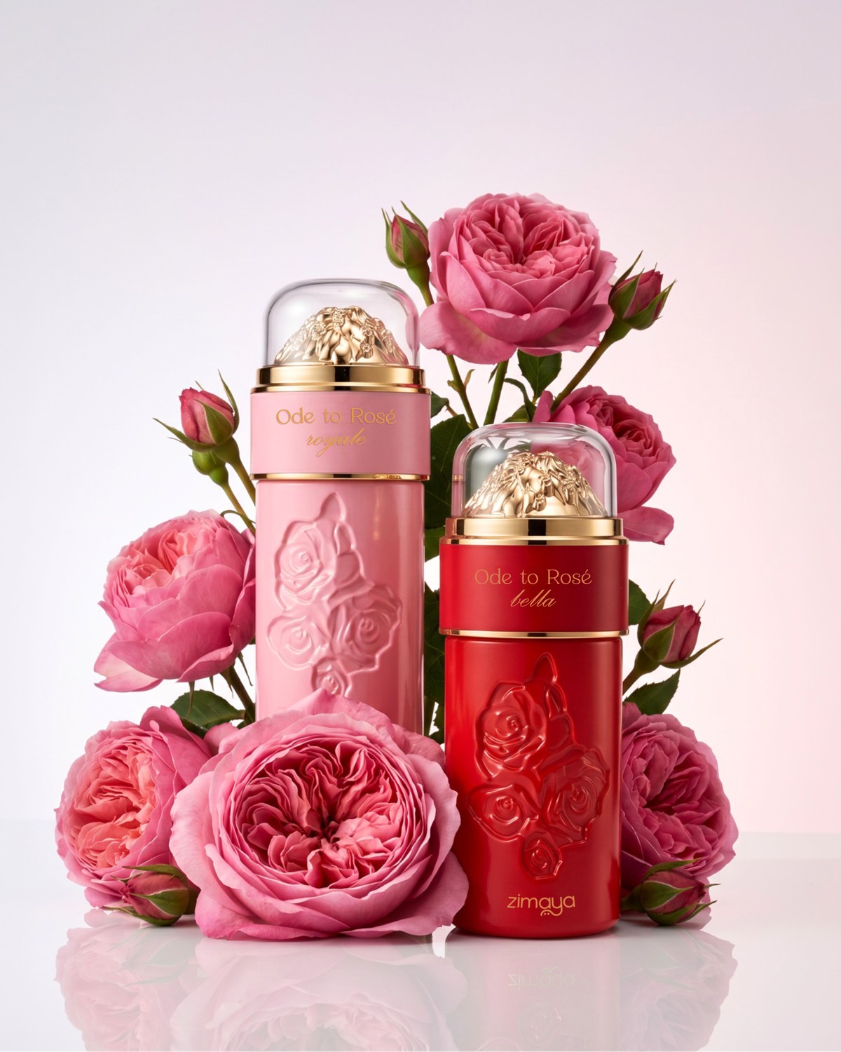 Pink and red Ode to Rose perfume bottles together with a bouquet of roses — AI perfume imagery by The Media Lab.